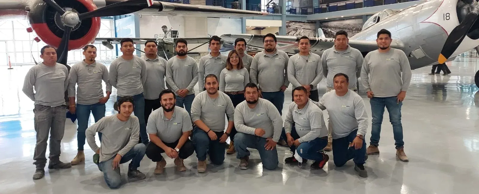 Tecimac technical team in a hangar