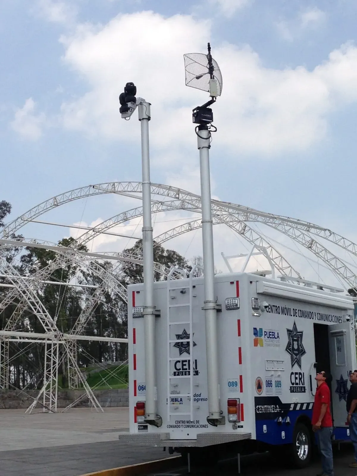 Telescopic surveillance poles and antenna on a mobile command and communications center